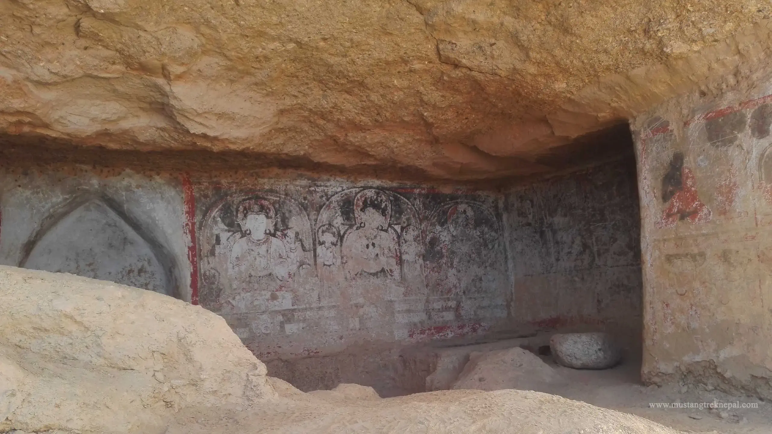 Ritseling Cave in Upper Mustang & Eroded murals on the walls